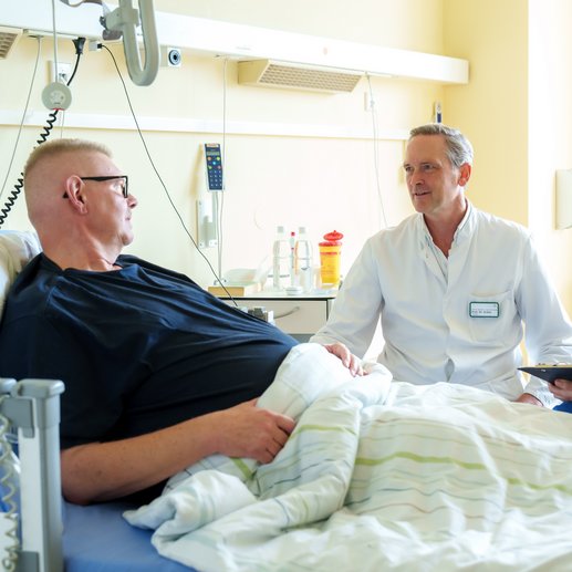 Visite am Patientenbett.